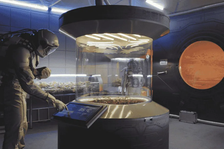 Astronauta em laboratório espacial analisando ambiente simulado, cena ligada à astrobiologia e à busca por sinais de vida fora da Terra.