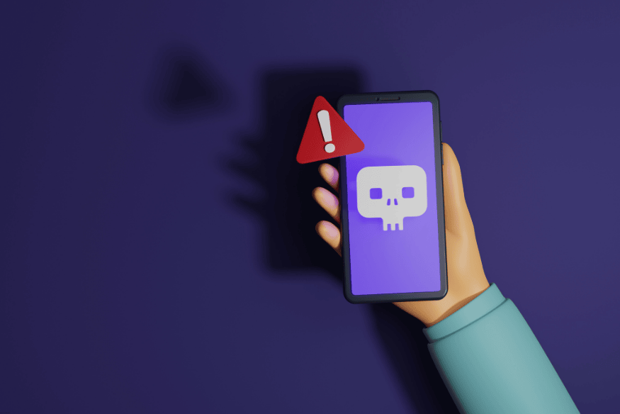 Tela de celular com alerta de perigo por golpe digital.