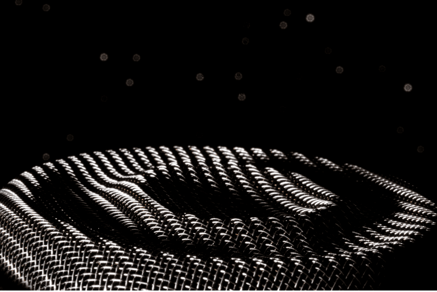 Visual abstrato em preto com formas onduladas, representação do conceito de vibrações e sinais associados às ondas gravitacionais.